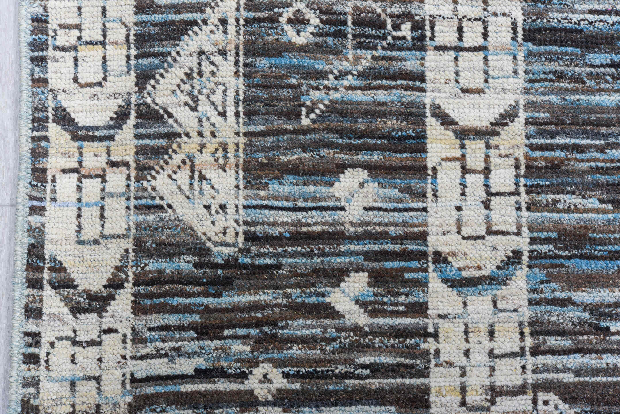 9' x 14' one-of-a-kind handmade vintage Tulu large size rug. Color palette: charcoal, ivory, sky blue, slate, cream, gray