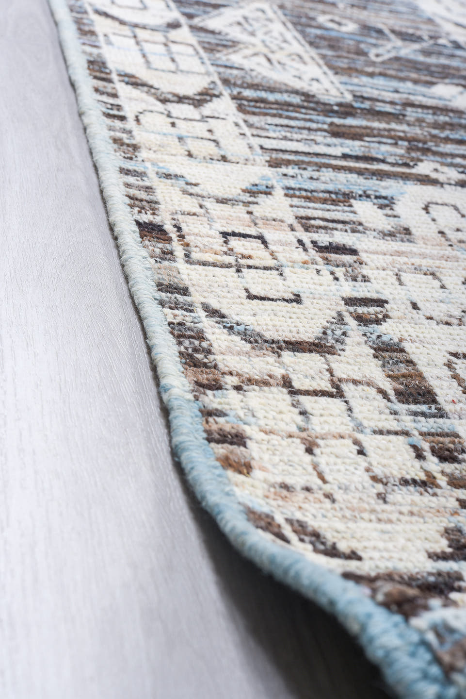 9' x 14' one-of-a-kind handmade vintage Tulu large size rug. Color palette: charcoal, ivory, sky blue, slate, cream, gray