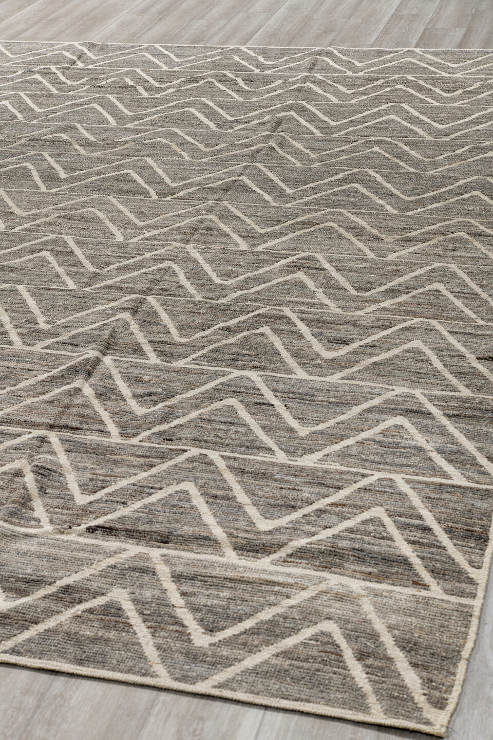 9' x 12' one-of-a-kind handmade vintage Tulu large size rug. Color palette: gray, ivory, taupe, charcoal, beige, black