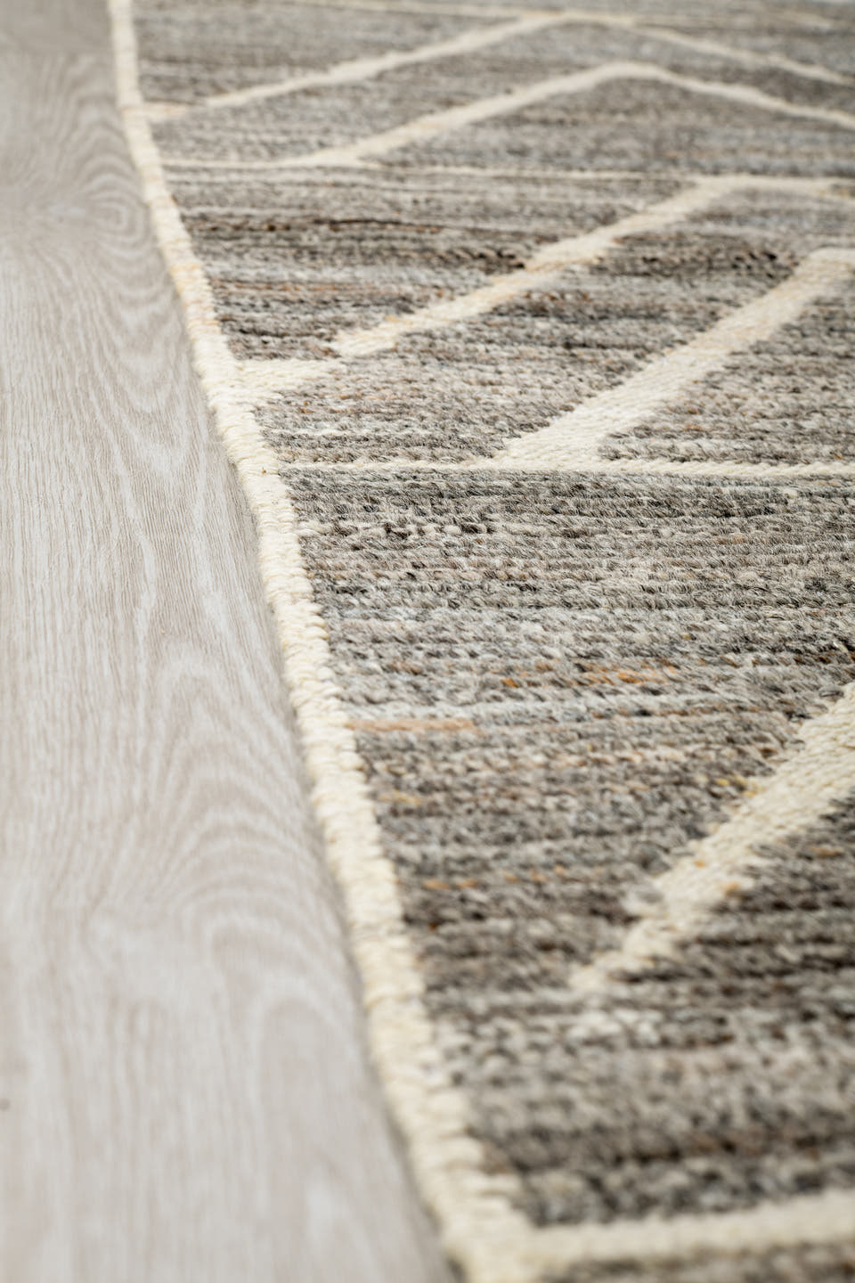 9' x 12' one-of-a-kind handmade vintage Tulu large size rug. Color palette: gray, ivory, taupe, charcoal, beige, black