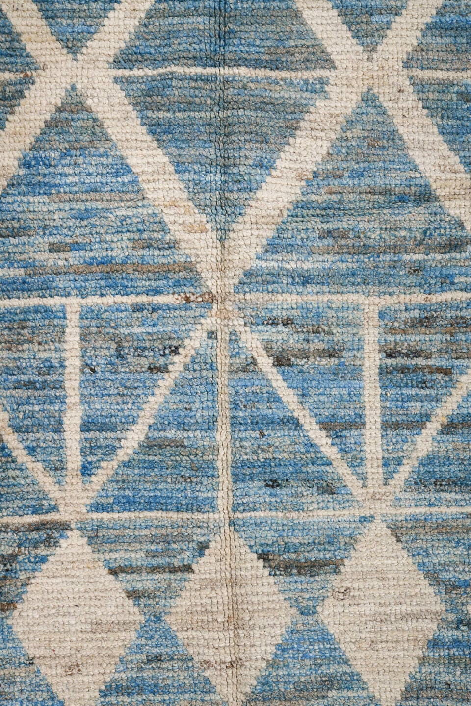 6' x 9' one-of-a-kind handmade vintage Tulu medium size rug. Color palette: sky blue, ivory, slate, denim, light blue, gray