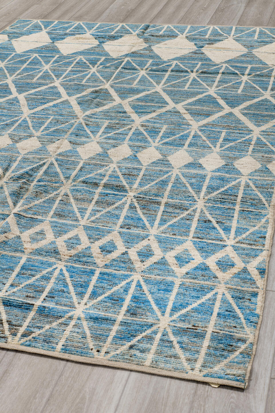 6' x 9' one-of-a-kind handmade vintage Tulu medium size rug. Color palette: sky blue, ivory, slate, denim, light blue, gray