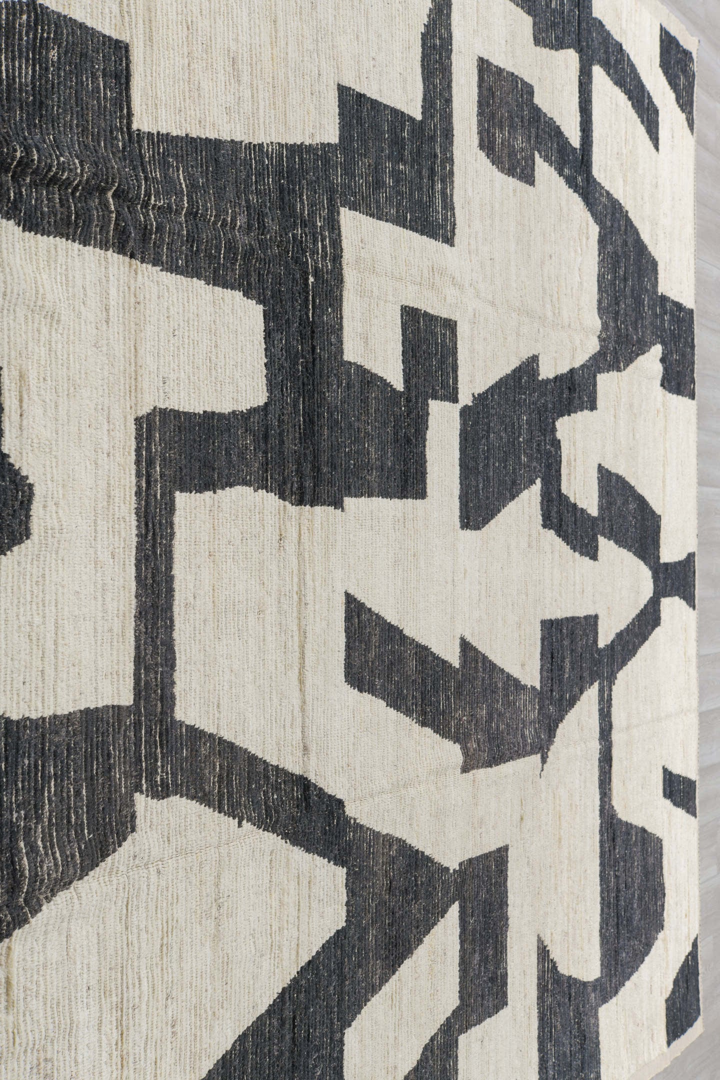 10' x 13' one-of-a-kind handmade vintage Tulu oversize rug. Color palette: ivory, charcoal, cream, black, gray