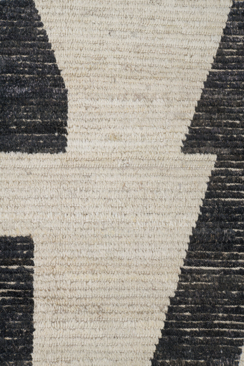 10' x 13' one-of-a-kind handmade vintage Tulu oversize rug. Color palette: ivory, charcoal, cream, black, gray