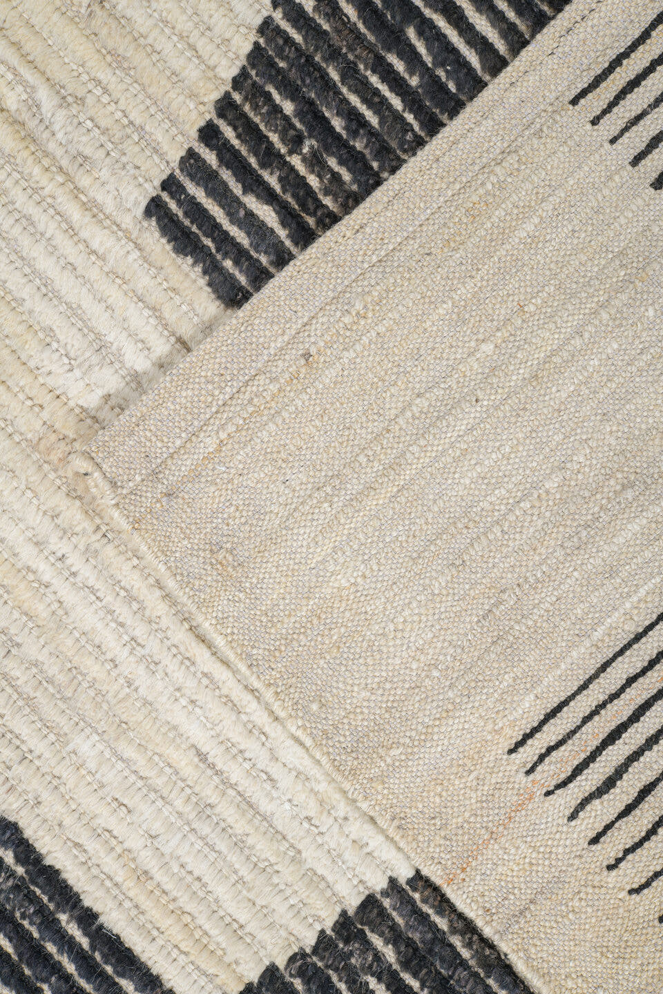 10' x 13' one-of-a-kind handmade vintage Tulu oversize rug. Color palette: ivory, charcoal, cream, black, gray