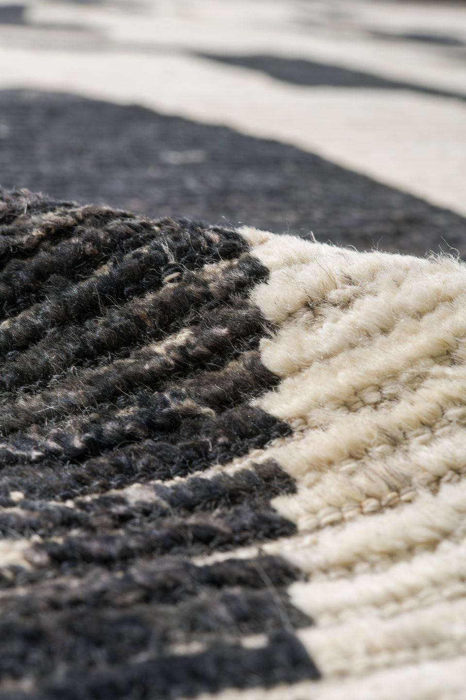 10' x 13' one-of-a-kind handmade vintage Tulu oversize rug. Color palette: ivory, charcoal, cream, black, gray