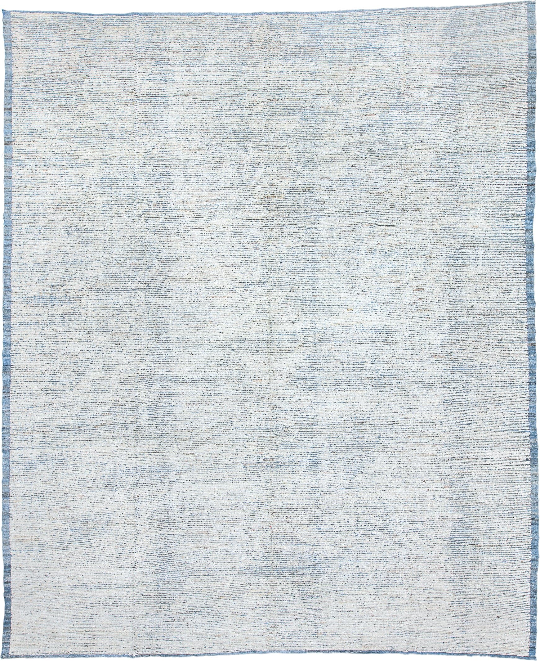 13' x 16' one-of-a-kind handmade vintage Tulu oversize rug. Color palette: ivory, pale blue, cream, light gray, light blue