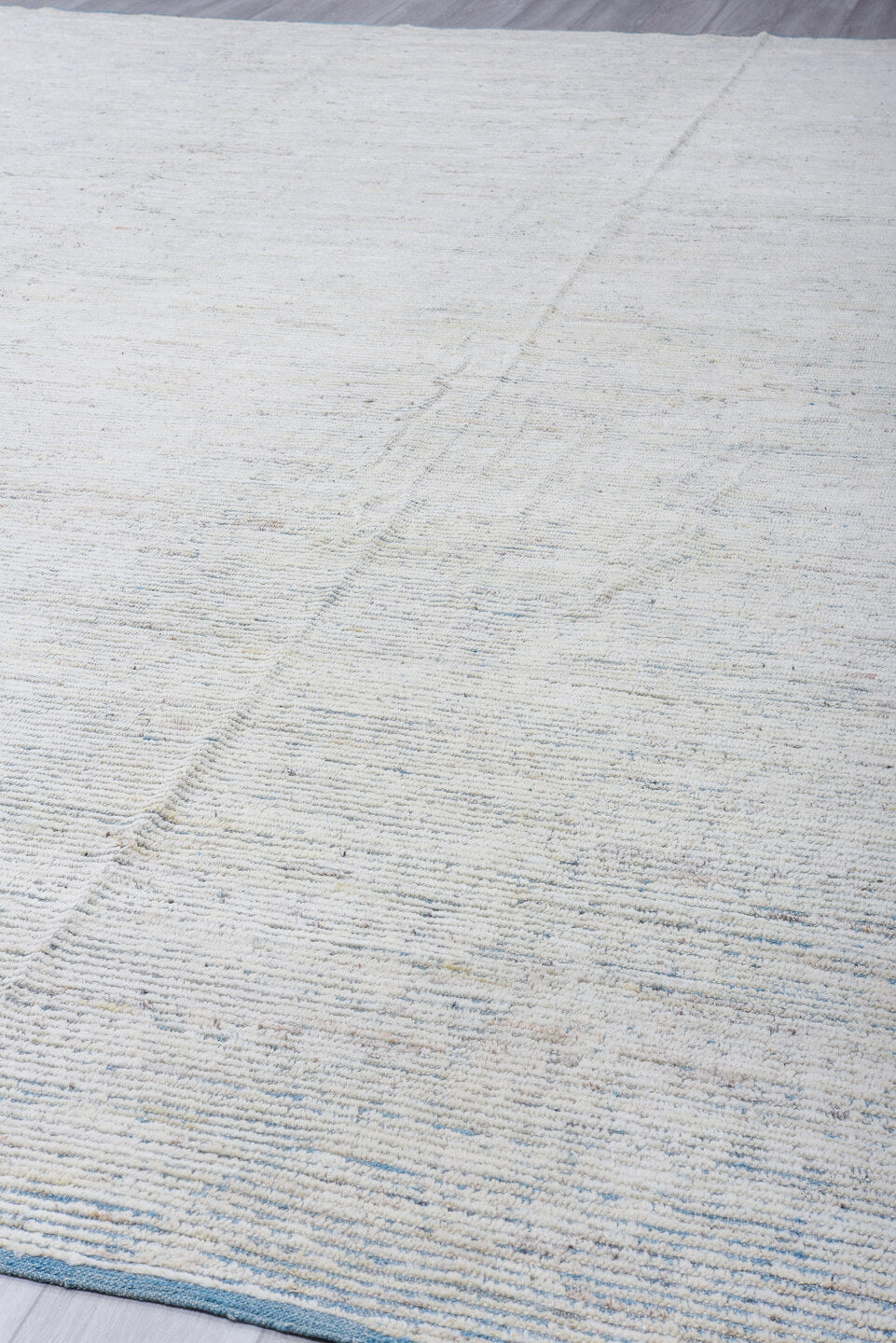 13' x 16' one-of-a-kind handmade vintage Tulu oversize rug. Color palette: ivory, pale blue, cream, light gray, light blue
