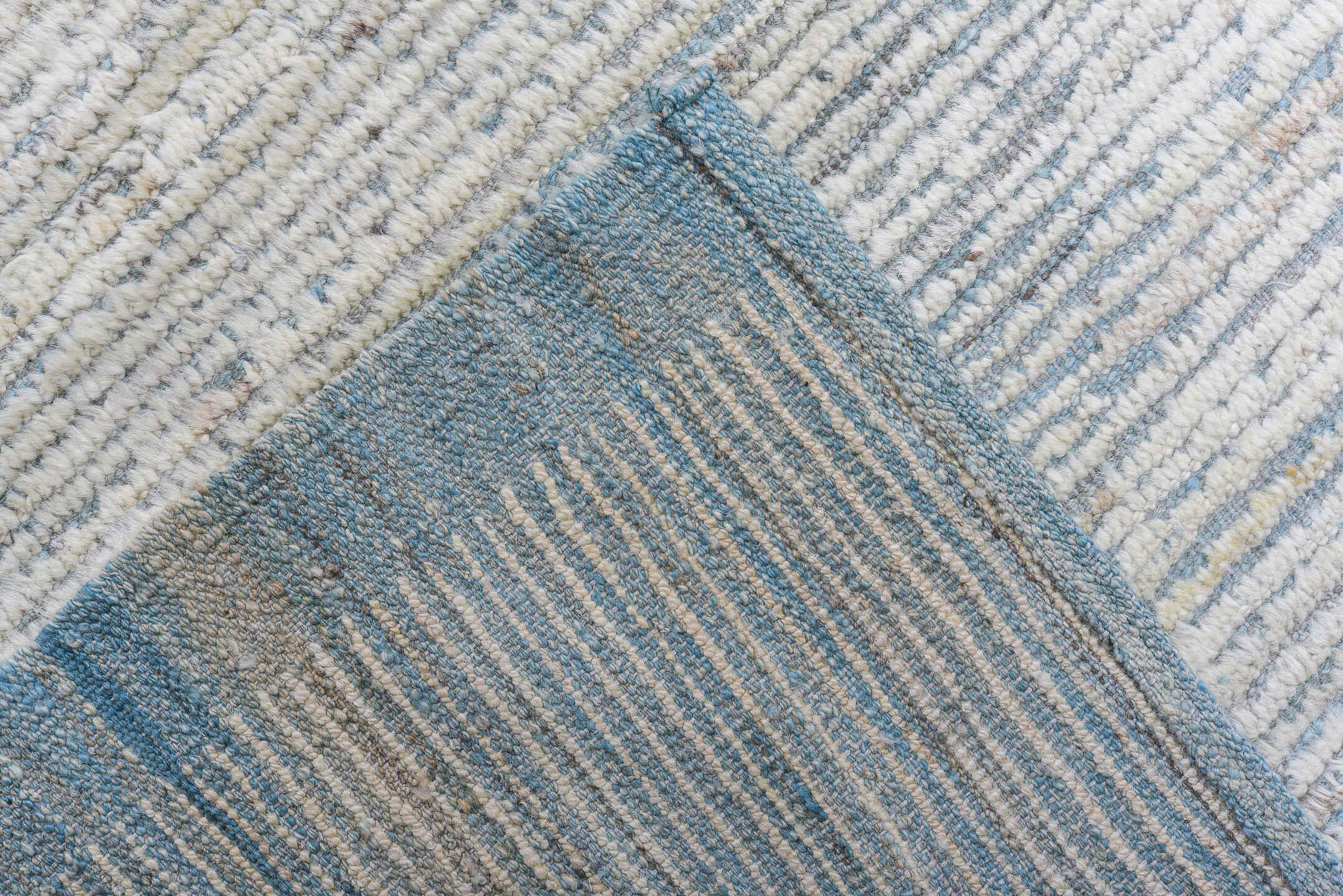 13' x 16' one-of-a-kind handmade vintage Tulu oversize rug. Color palette: ivory, pale blue, cream, light gray, light blue