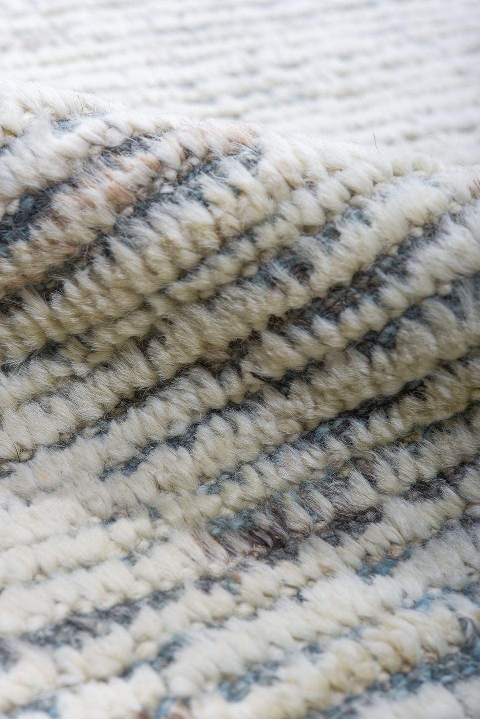 13' x 16' one-of-a-kind handmade vintage Tulu oversize rug. Color palette: ivory, pale blue, cream, light gray, light blue