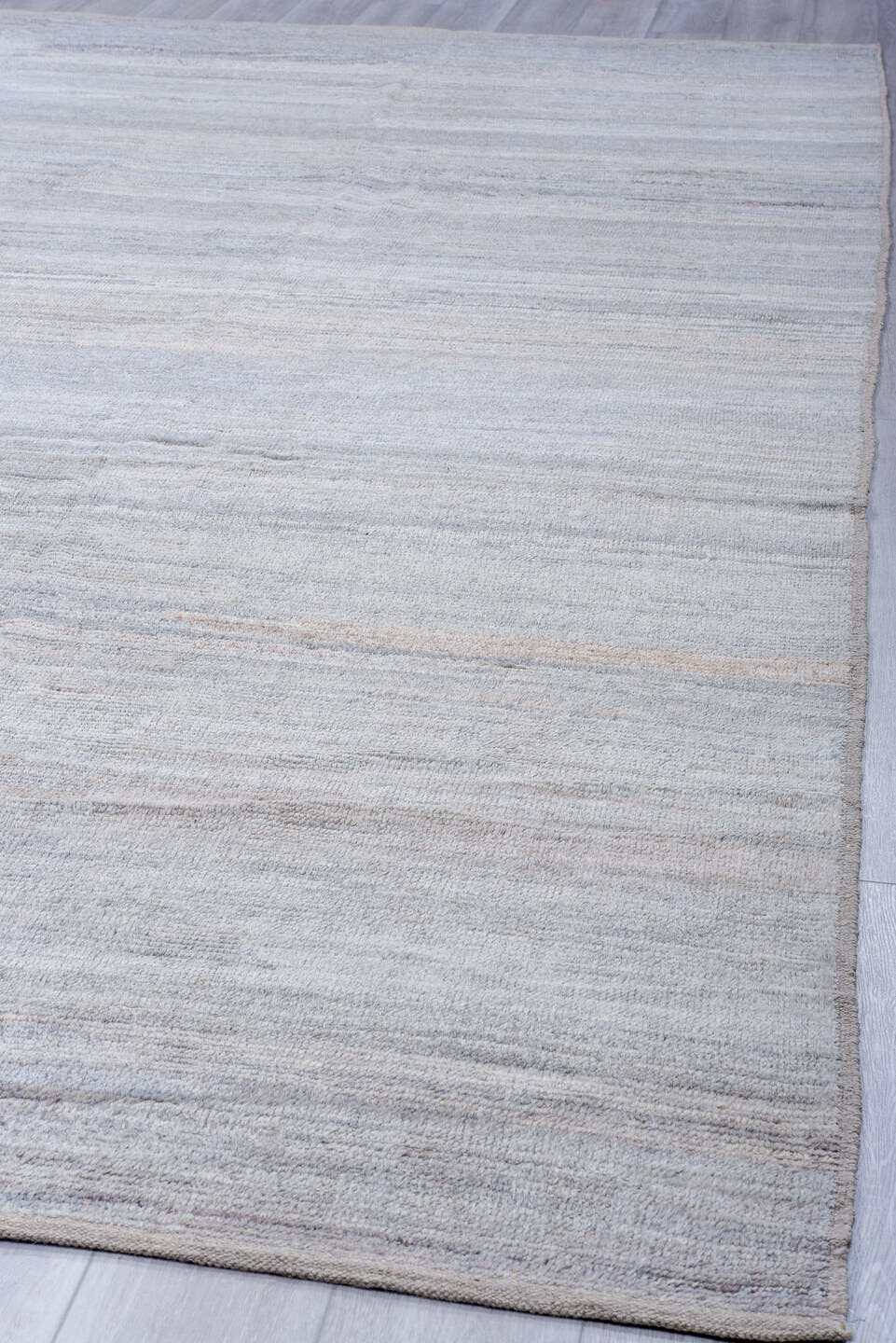 9' x 14' one-of-a-kind handmade vintage Tulu large size rug. Color palette: pale blue, ivory, light gray, taupe, light blue