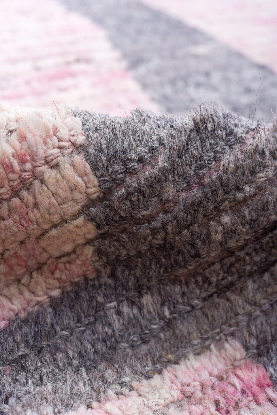 12' x 15' one-of-a-kind handmade vintage Tulu oversize rug. Color palette: pink, ivory, charcoal, gray, black