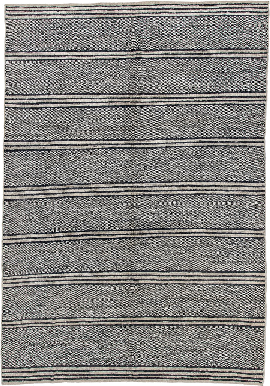 6' x 9' one-of-a-kind handmade vintage Tulu medium size rug. Color palette: charcoal, ivory, gray, black
