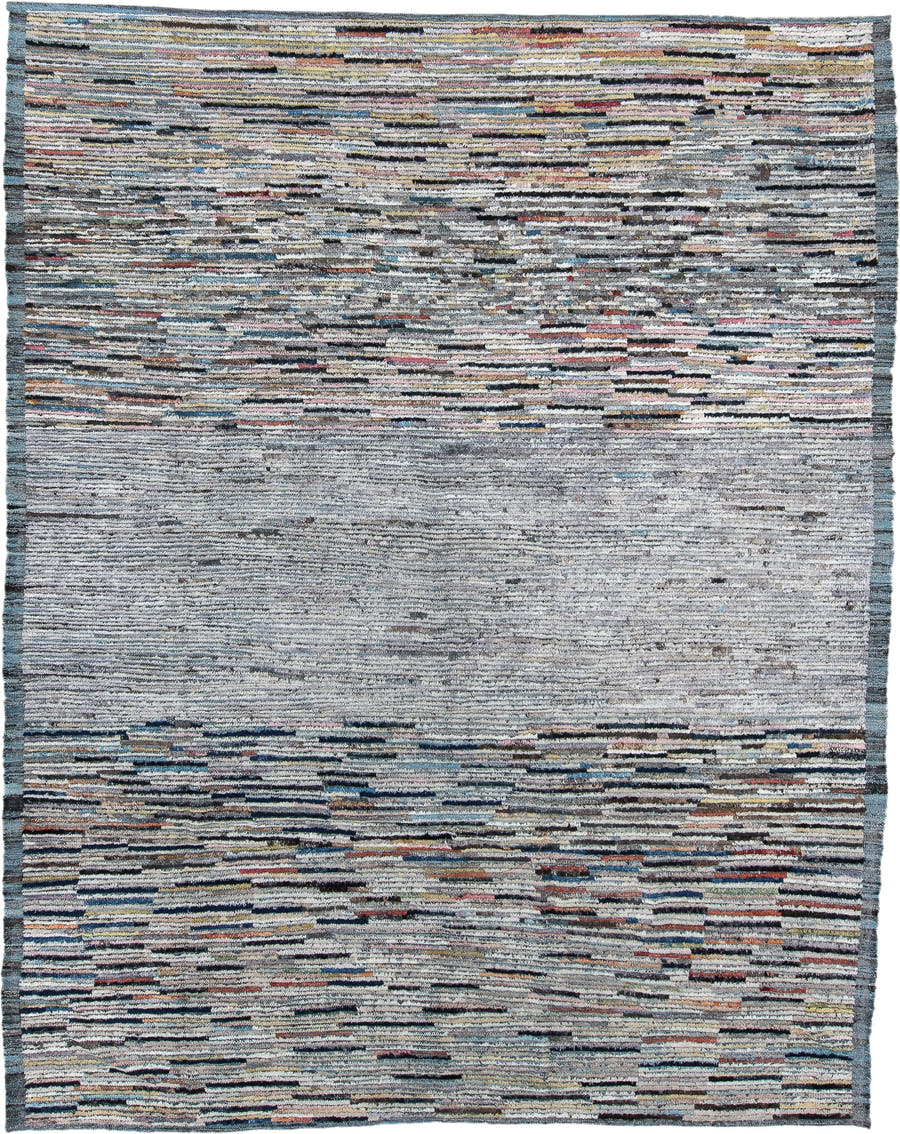 7' x 9' one-of-a-kind handmade vintage Tulu rug. Color palette: gray, ivory, slate, charcoal, taupe, blush, rust, blue