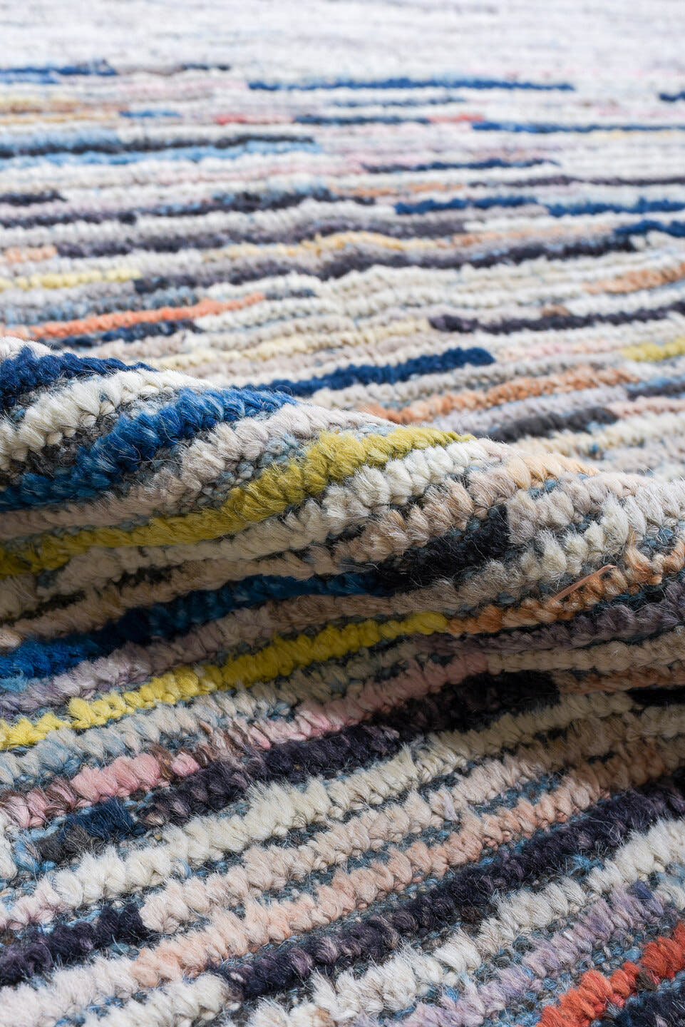 7' x 9' one-of-a-kind handmade vintage Tulu rug. Color palette: gray, ivory, slate, charcoal, taupe, blush, rust, blue
