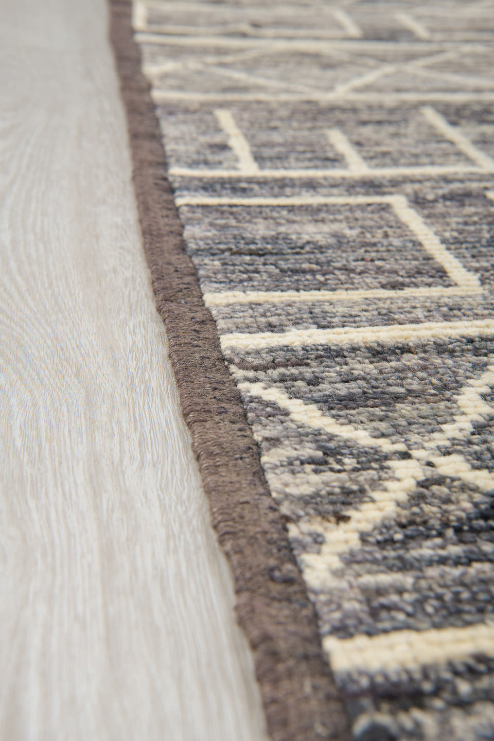 9' x 11' one-of-a-kind handmade vintage Tulu large size rug. Color palette: charcoal, ivory, slate, taupe, gray, black