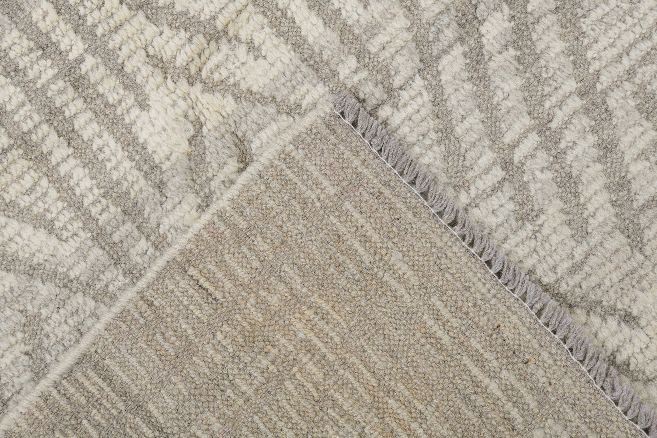 8' x 9' one-of-a-kind handmade vintage Tulu rug. Color palette: ivory, taupe, cream, beige, gray
