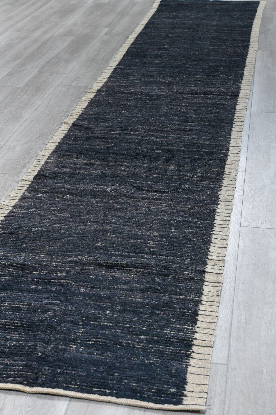 2' x 16' one-of-a-kind handmade vintage Tulu runner rug. Color palette: charcoal, ivory, slate, blue gray, black, gray, blue