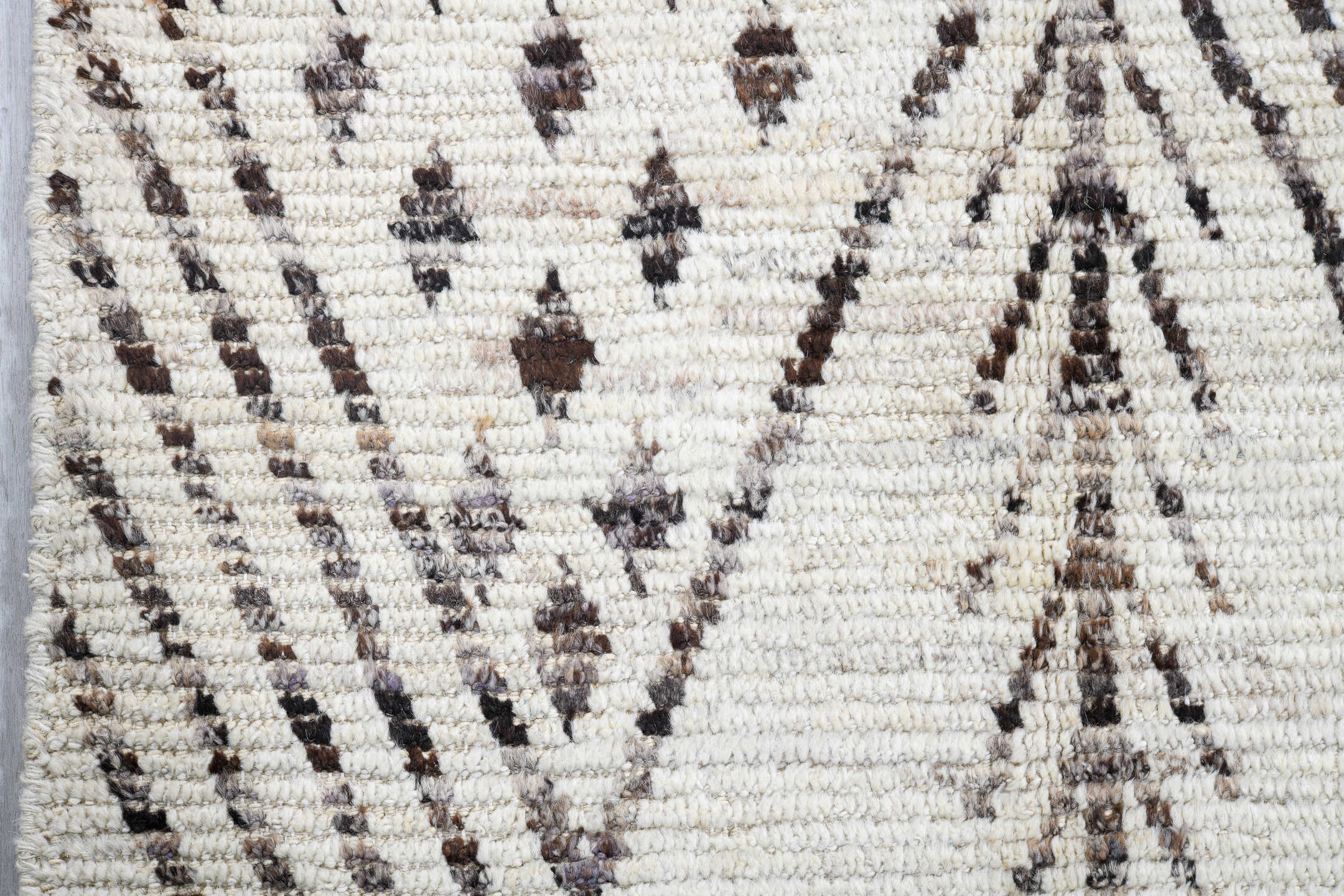 4' x 18' one-of-a-kind handmade vintage Tulu runner rug. Color palette: ivory, charcoal, taupe, brown, black, gray, beige