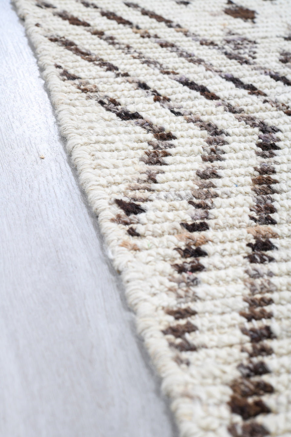 4' x 18' one-of-a-kind handmade vintage Tulu runner rug. Color palette: ivory, charcoal, taupe, brown, black, gray, beige