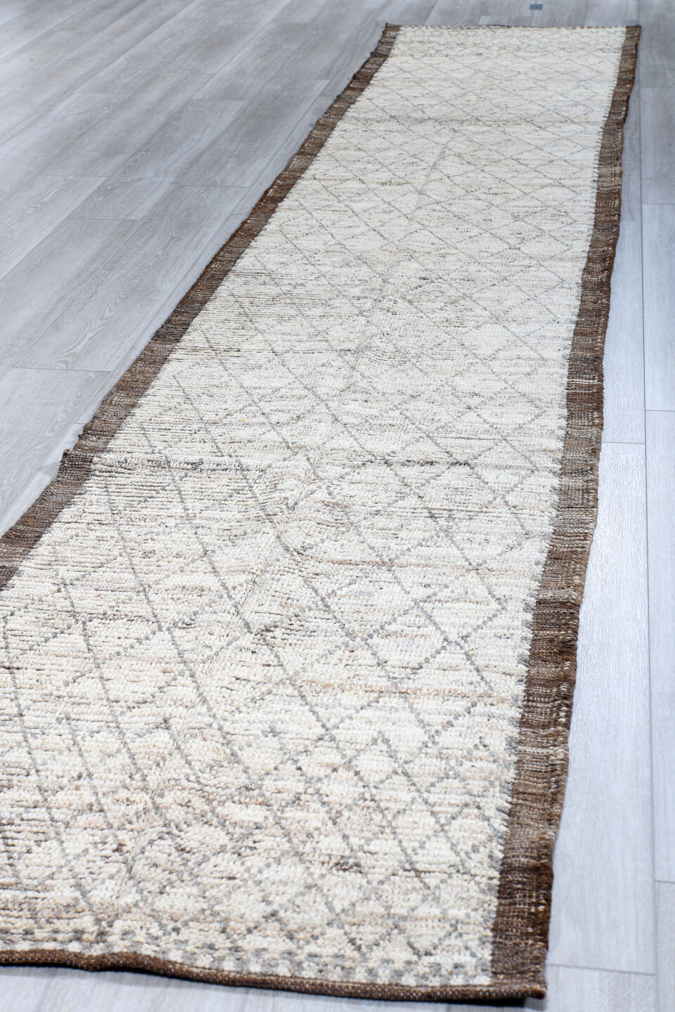 2' x 16' one-of-a-kind handmade vintage Tulu runner rug. Color palette: ivory, brown, taupe, camel, charcoal, beige, gray