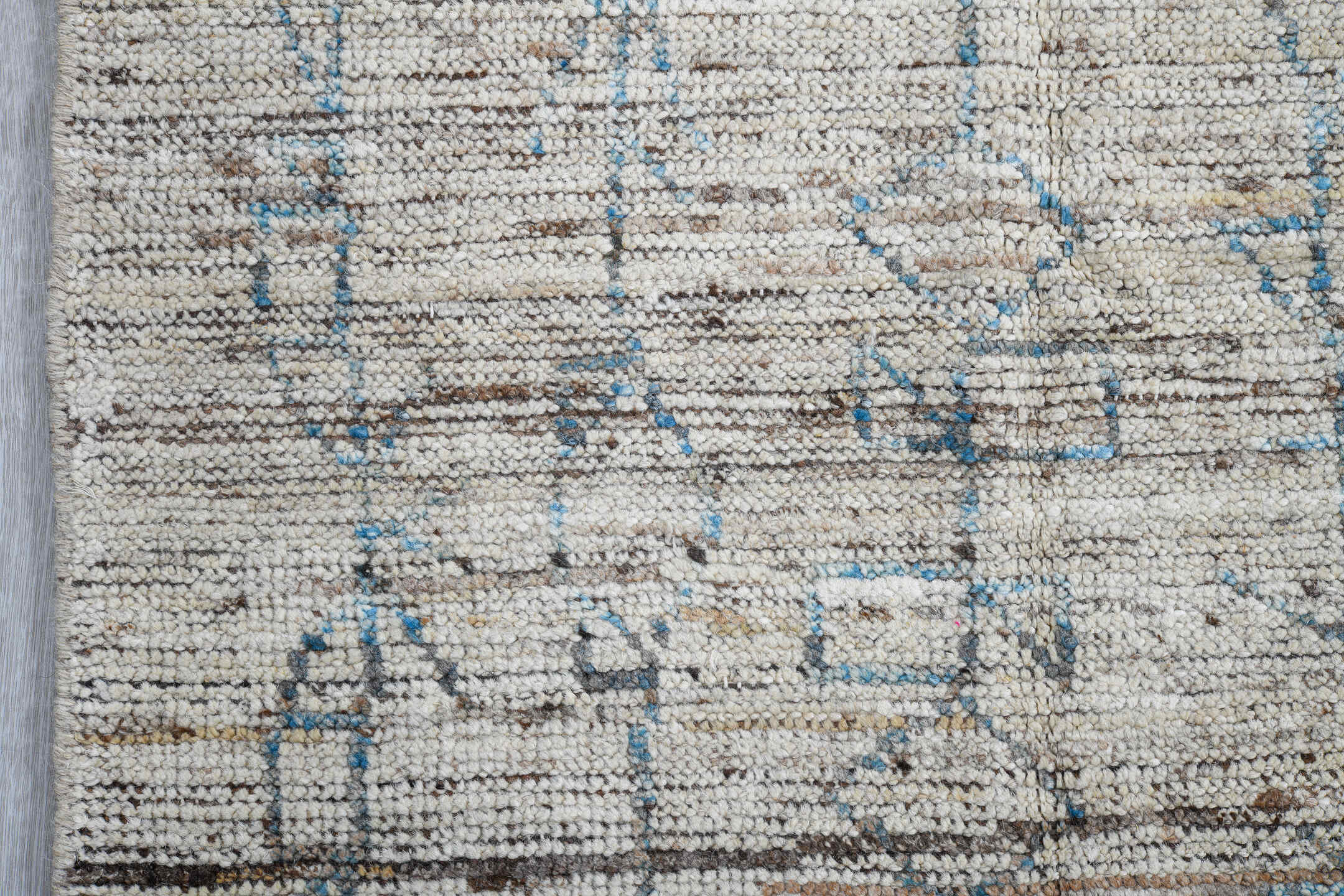 3' x 9' one-of-a-kind handmade vintage Tulu runner rug. Color palette: ivory, blue gray, taupe, brown, gray, blue, beige