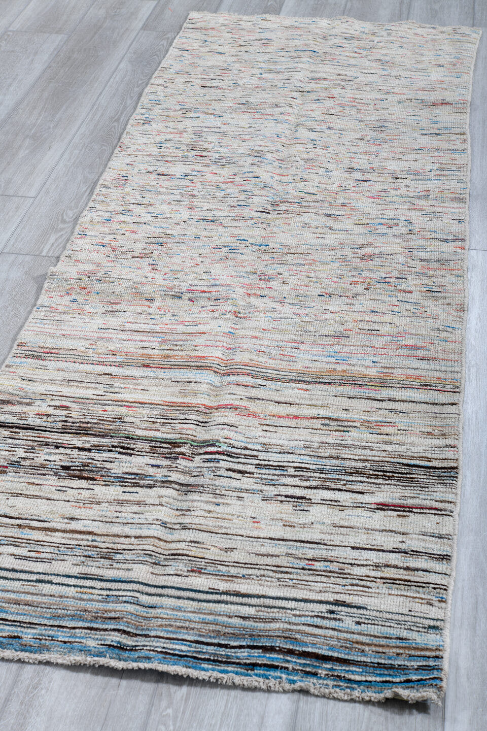 2' x 7' one-of-a-kind handmade vintage Tulu runner rug. Color palette: ivory, charcoal, slate, sky_blue, rust, taupe, gray
