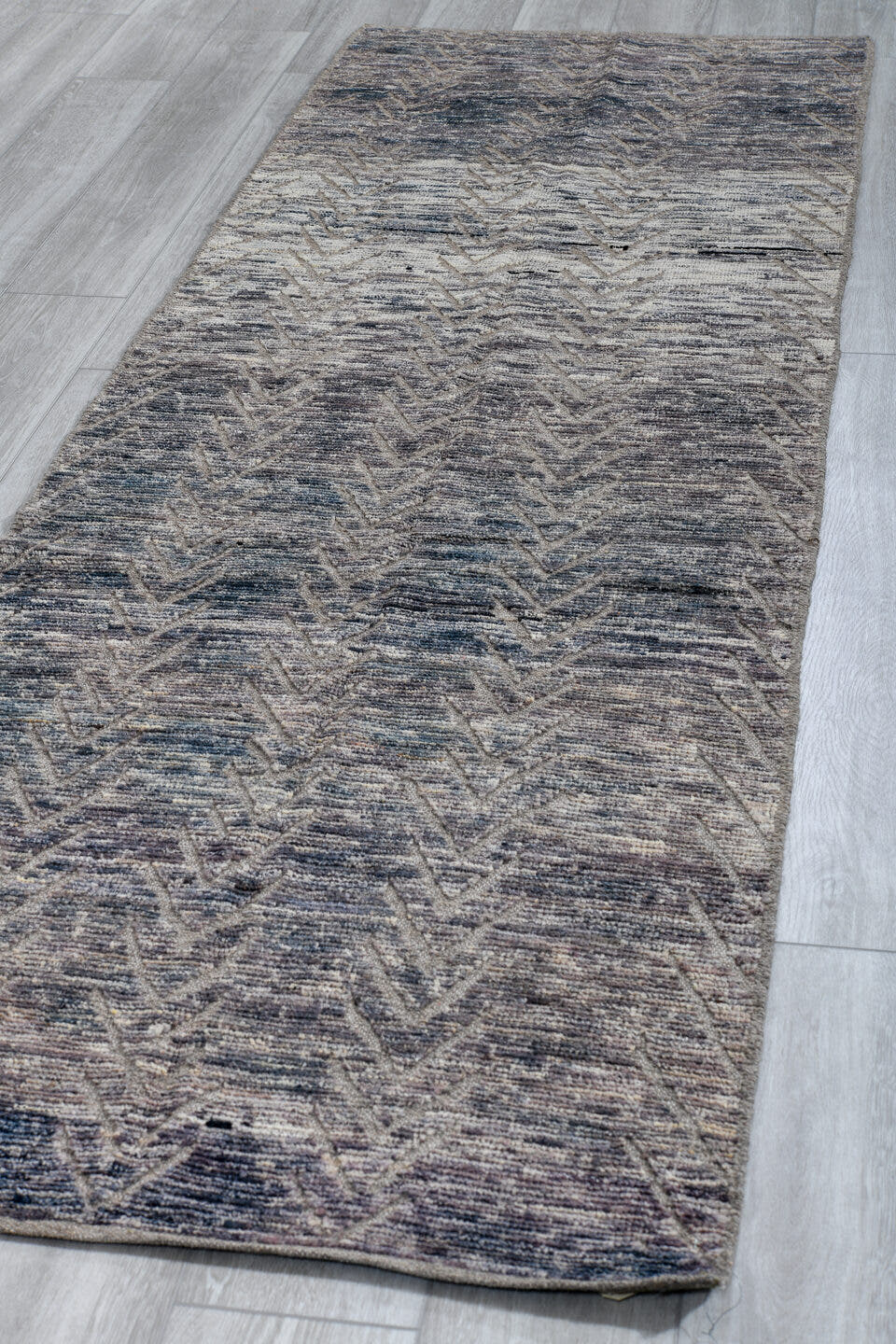 3' x 9' one-of-a-kind handmade vintage Tulu runner rug. Color palette: blue-gray, ivory, slate, silver, gray, blue