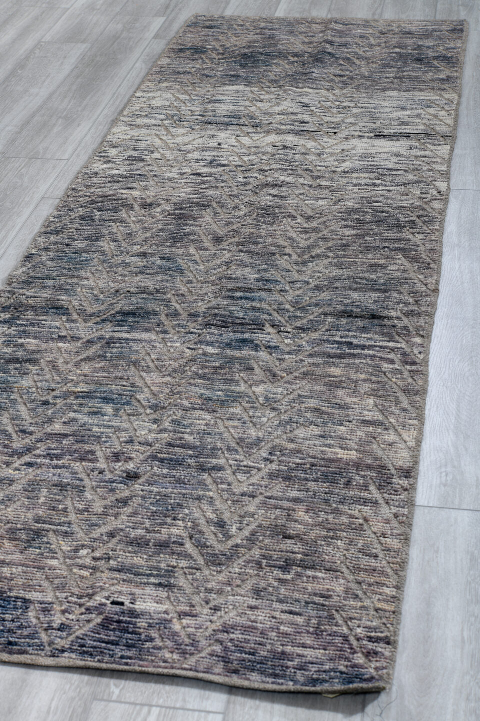 3' x 9' one-of-a-kind handmade vintage Tulu runner rug. Color palette: blue-gray, ivory, slate, silver, gray, blue
