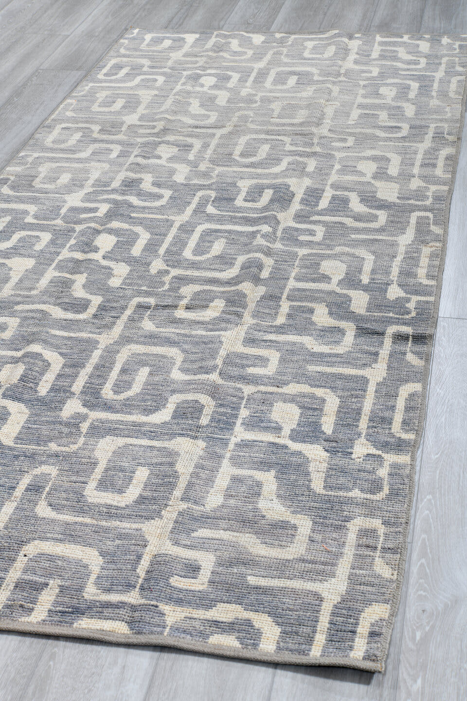 4' x 9' one-of-a-kind handmade vintage Tulu runner rug. Color palette: blue_gray, ivory, slate, cream, gray, blue