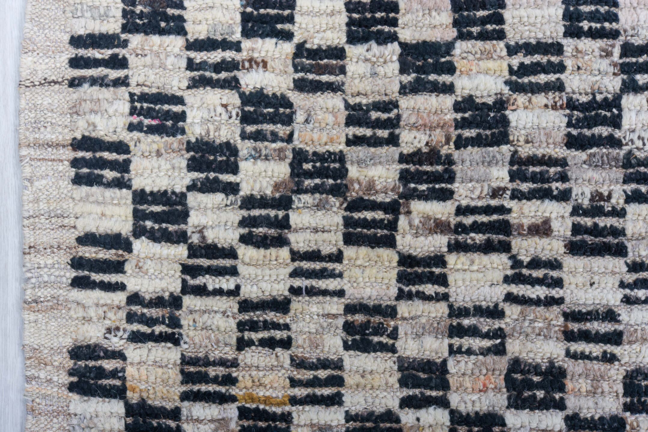 5' x 14' one-of-a-kind handmade vintage Tulu rug. Color palette: ivory, charcoal, gray, slate, blue, ochre, black, gold