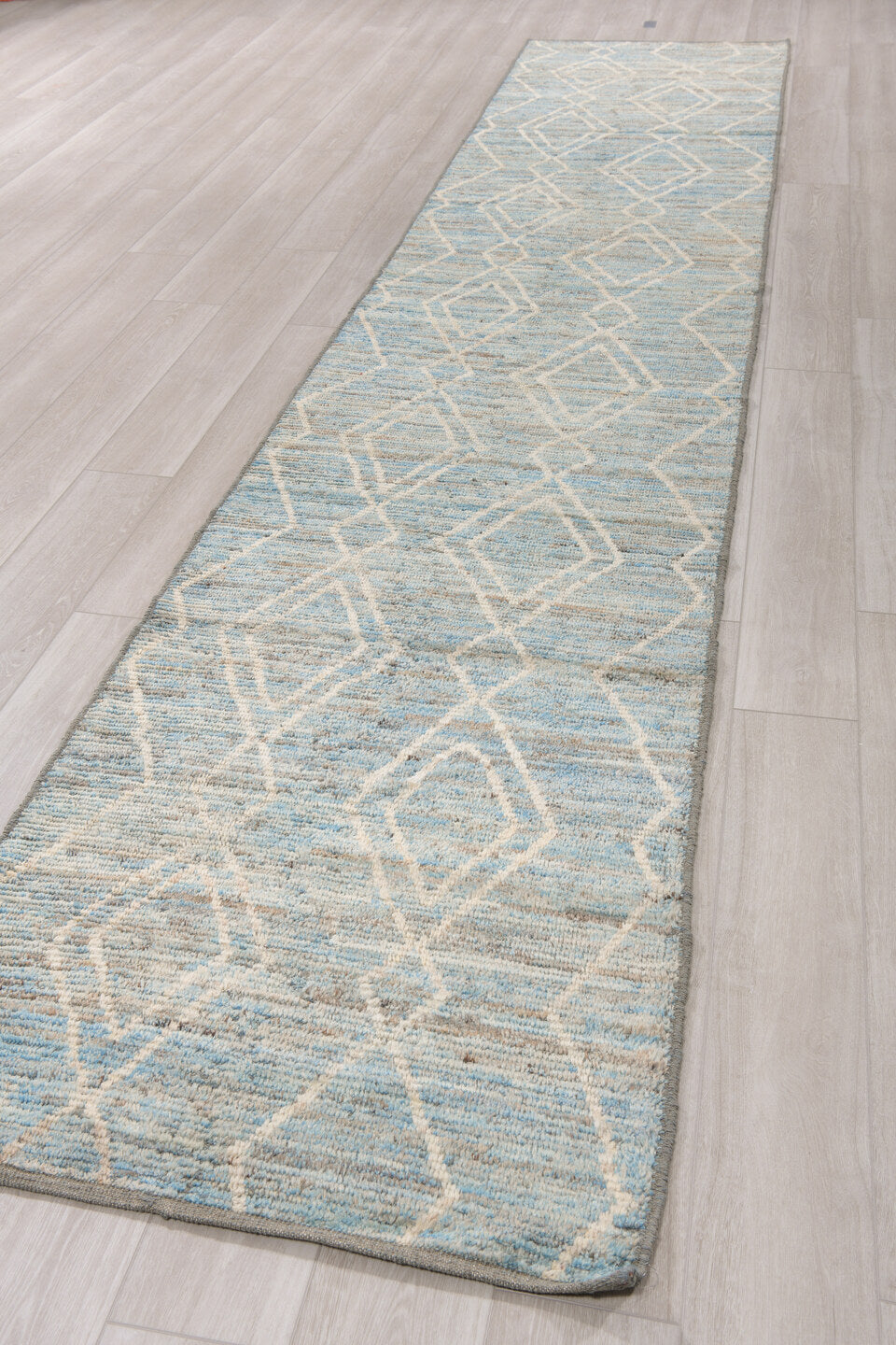 3' x 16' one-of-a-kind handmade vintage Tulu runner rug. Color palette: sky blue, ivory, slate, cream, light blue, gray