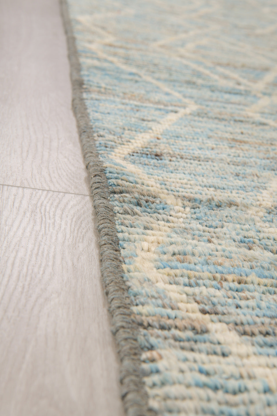 3' x 16' one-of-a-kind handmade vintage Tulu runner rug. Color palette: sky blue, ivory, slate, cream, light blue, gray