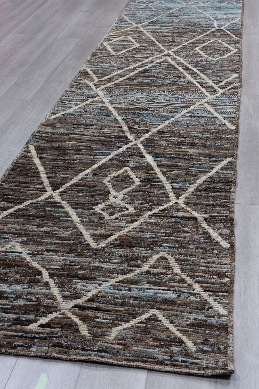 3' x 14' one-of-a-kind handmade vintage Tulu runner rug. Color palette: brown, ivory, sky blue, taupe, charcoal, light blue