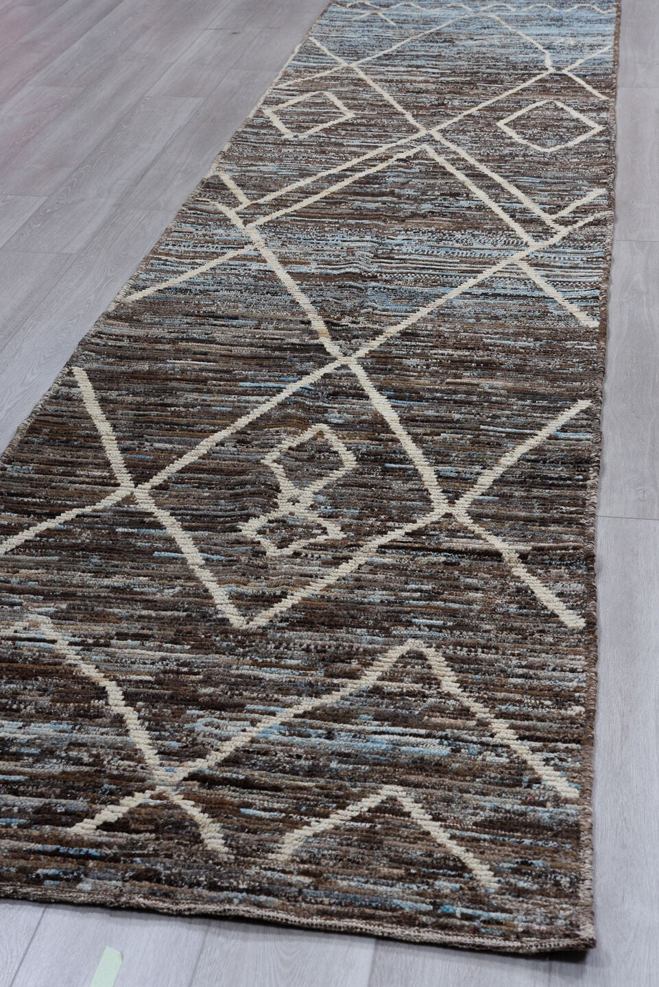 3' x 14' one-of-a-kind handmade vintage Tulu runner rug. Color palette: brown, ivory, sky blue, taupe, charcoal, light blue