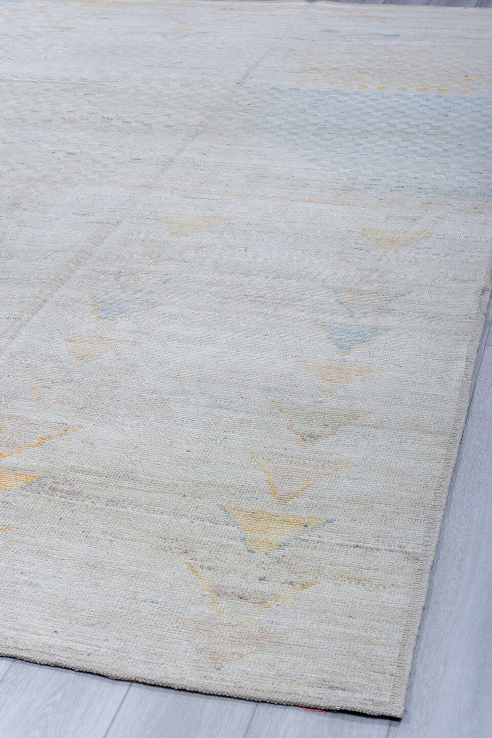 9' x 12' one-of-a-kind handmade vintage Tulu large size rug. Color palette: ivory, cream, pale blue, peach, beige, sand