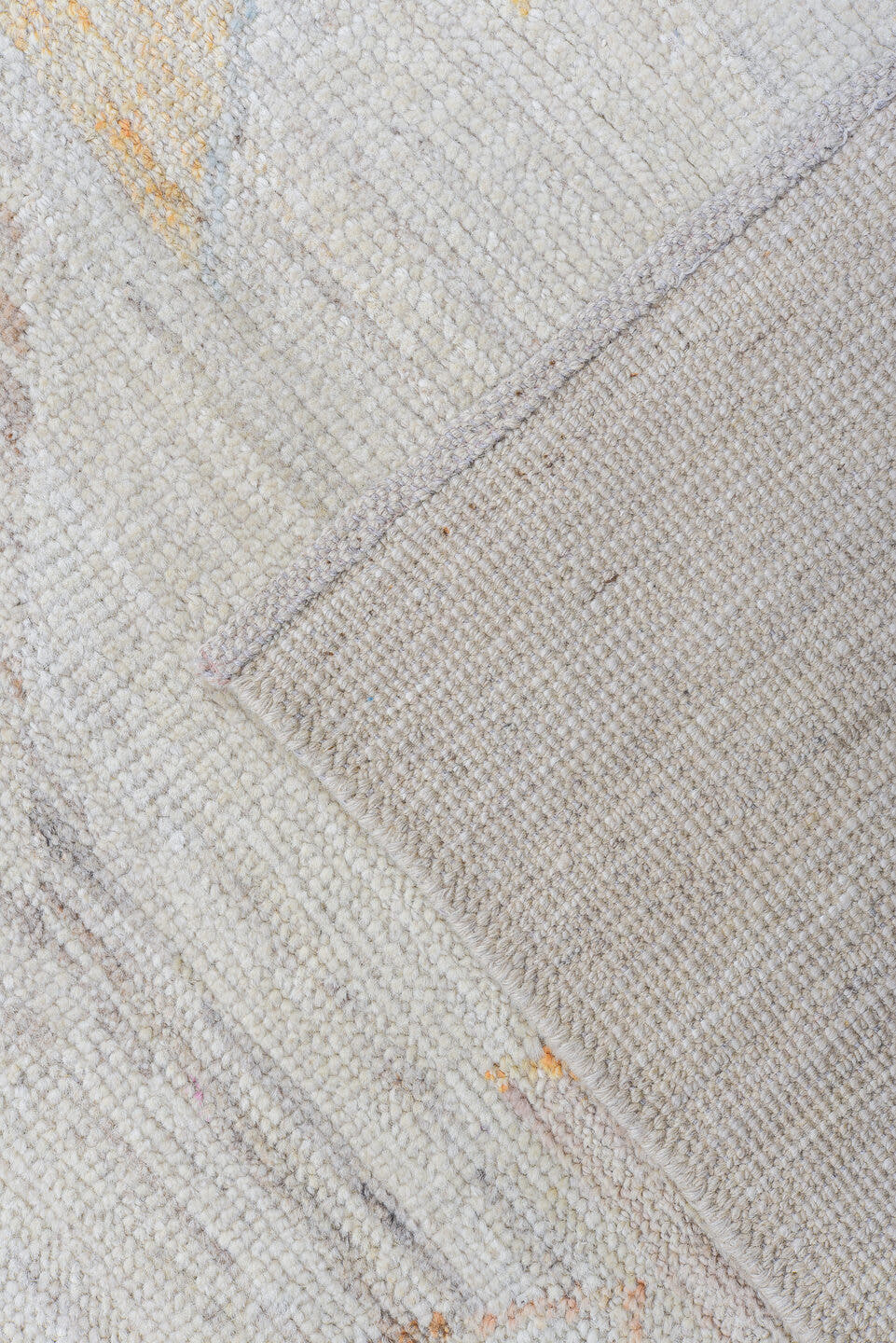 9' x 12' one-of-a-kind handmade vintage Tulu large size rug. Color palette: ivory, cream, pale blue, peach, beige, sand