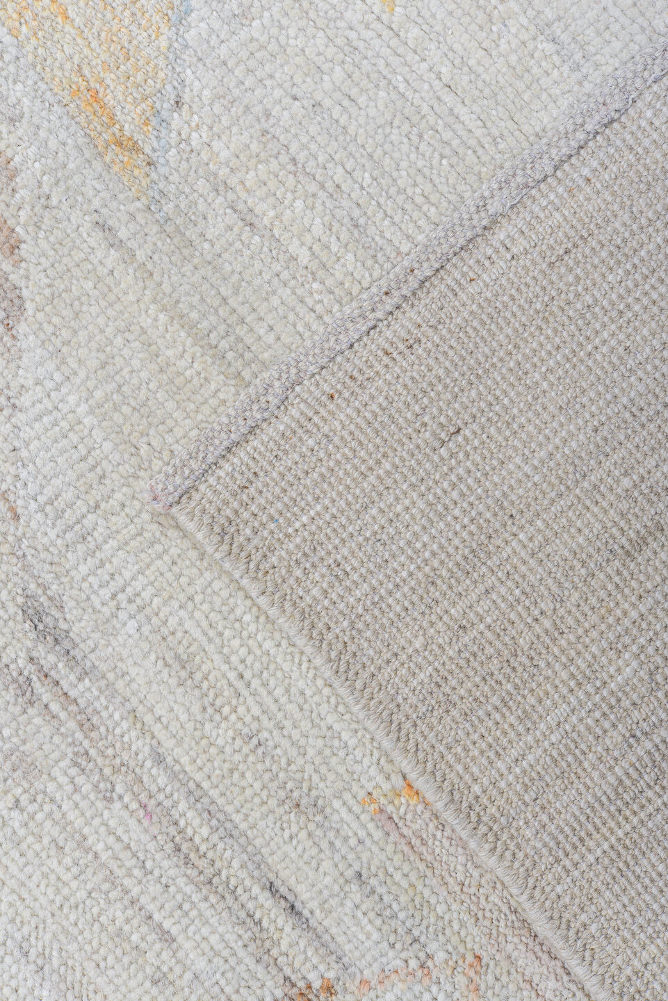 9' x 12' one-of-a-kind handmade vintage Tulu large size rug. Color palette: ivory, cream, pale blue, peach, beige, sand