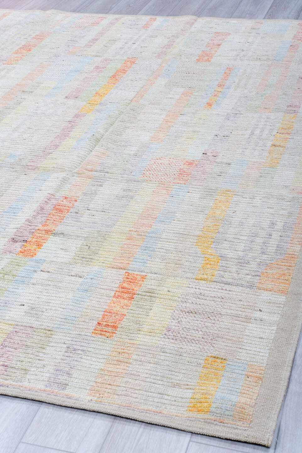 8' x 9' one-of-a-kind handmade vintage Tulu rug. Color palette: ivory, pale blue, peach, lavender, soft gold, sage, blush