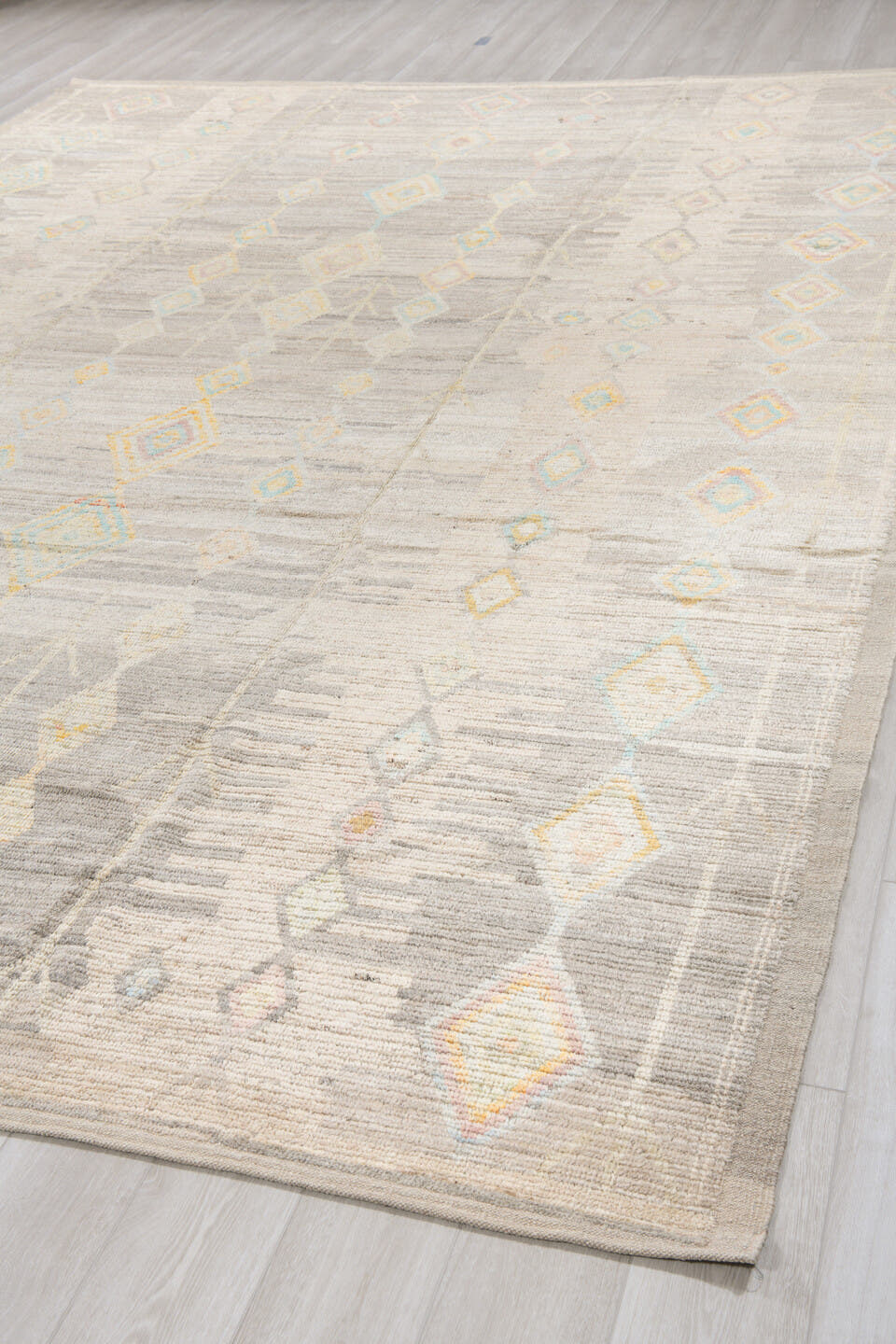 10' x 14' one-of-a-kind handmade vintage Tulu large size rug. Color palette: ivory, taupe, cream, pale aqua, gold, blush