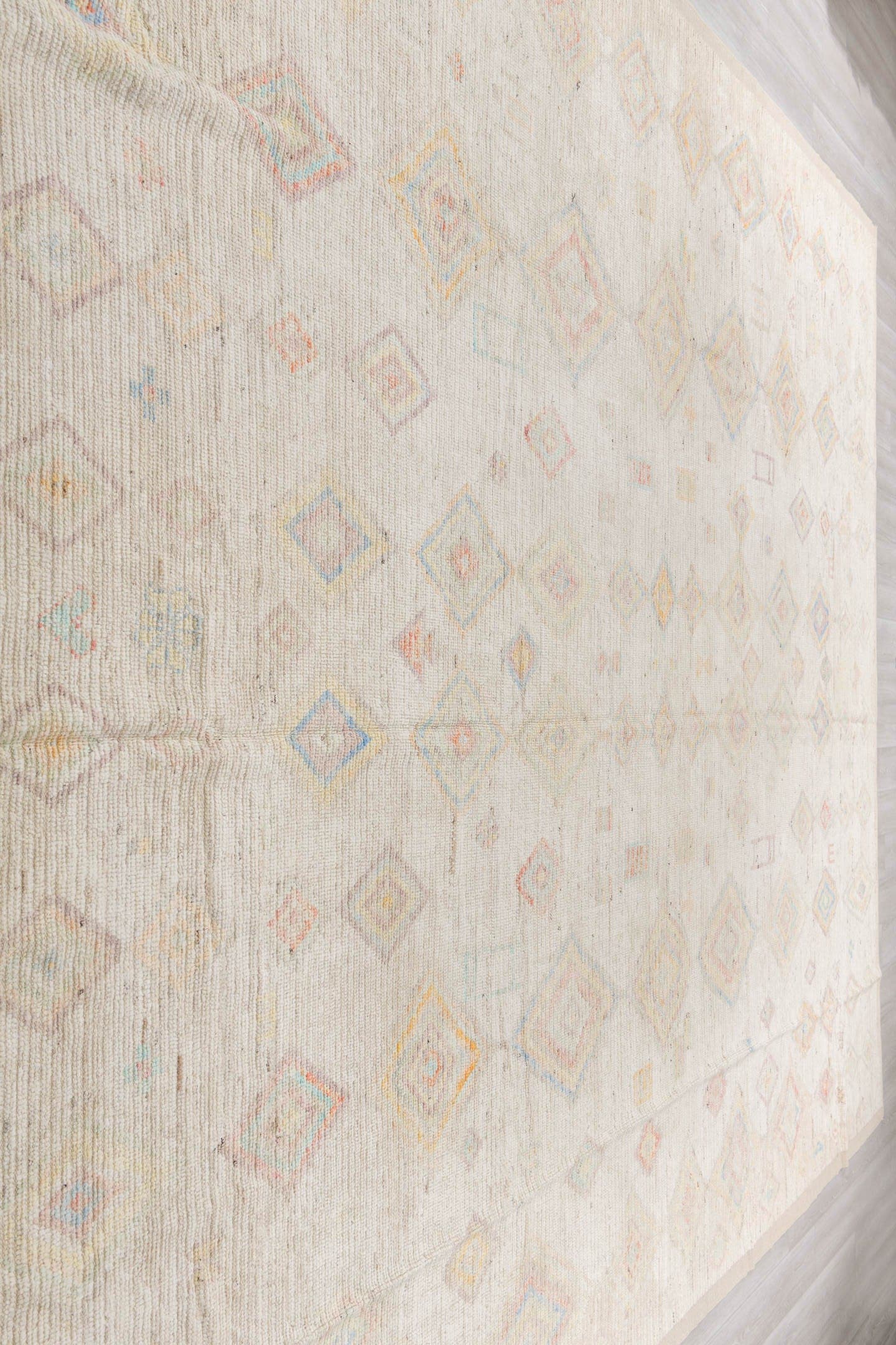 12' x 15' one-of-a-kind handmade vintage Tulu oversize rug. Color palette: ivory, cream, pale blue, coral, gold, sage