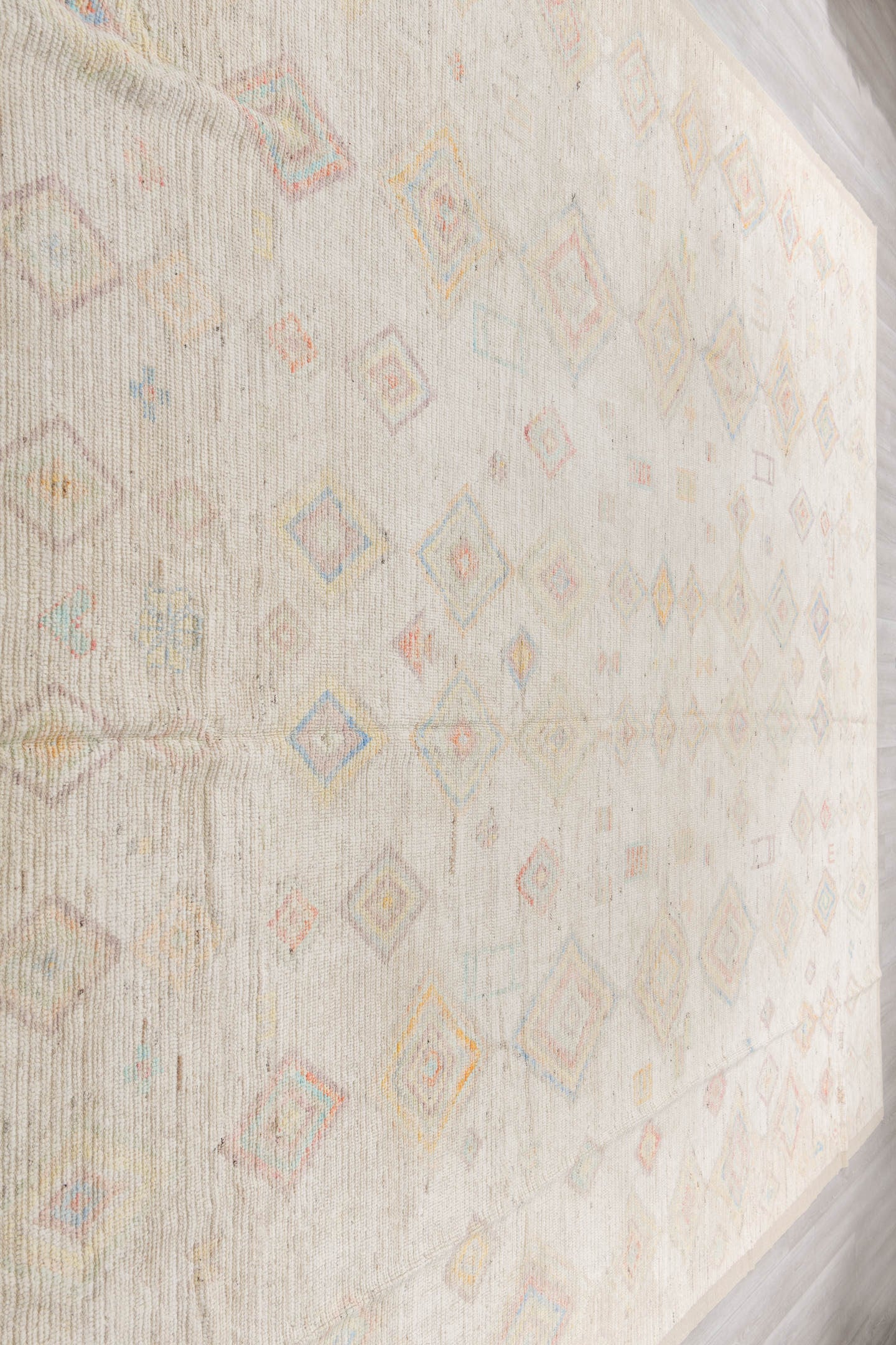 12' x 15' one-of-a-kind handmade vintage Tulu oversize rug. Color palette: ivory, cream, pale blue, coral, gold, sage