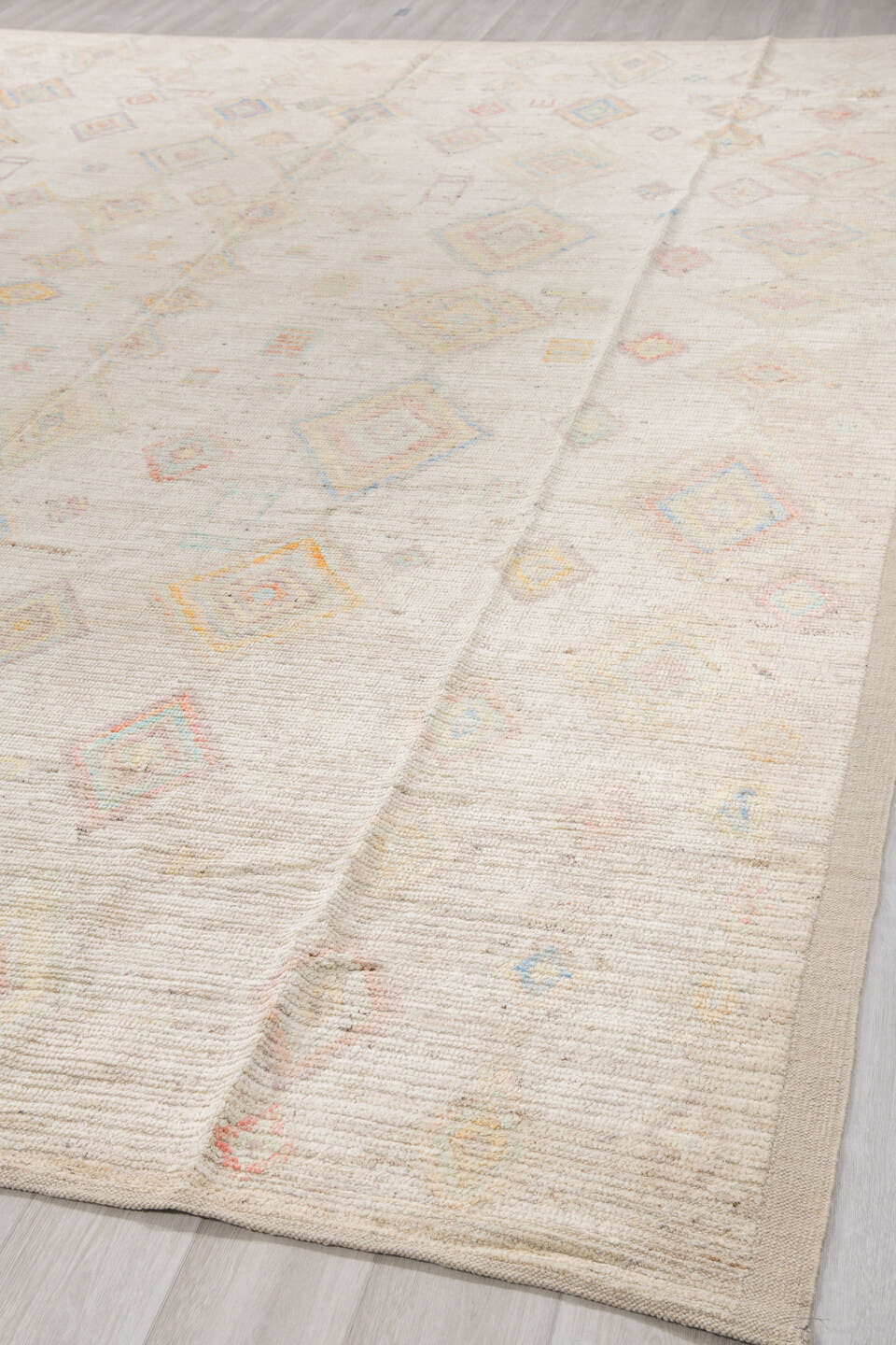 12' x 15' one-of-a-kind handmade vintage Tulu oversize rug. Color palette: ivory, cream, pale blue, coral, gold, sage