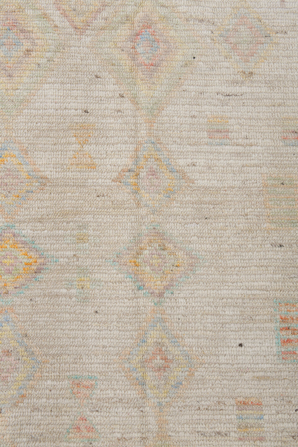 12' x 15' one-of-a-kind handmade vintage Tulu oversize rug. Color palette: ivory, cream, pale blue, coral, gold, sage