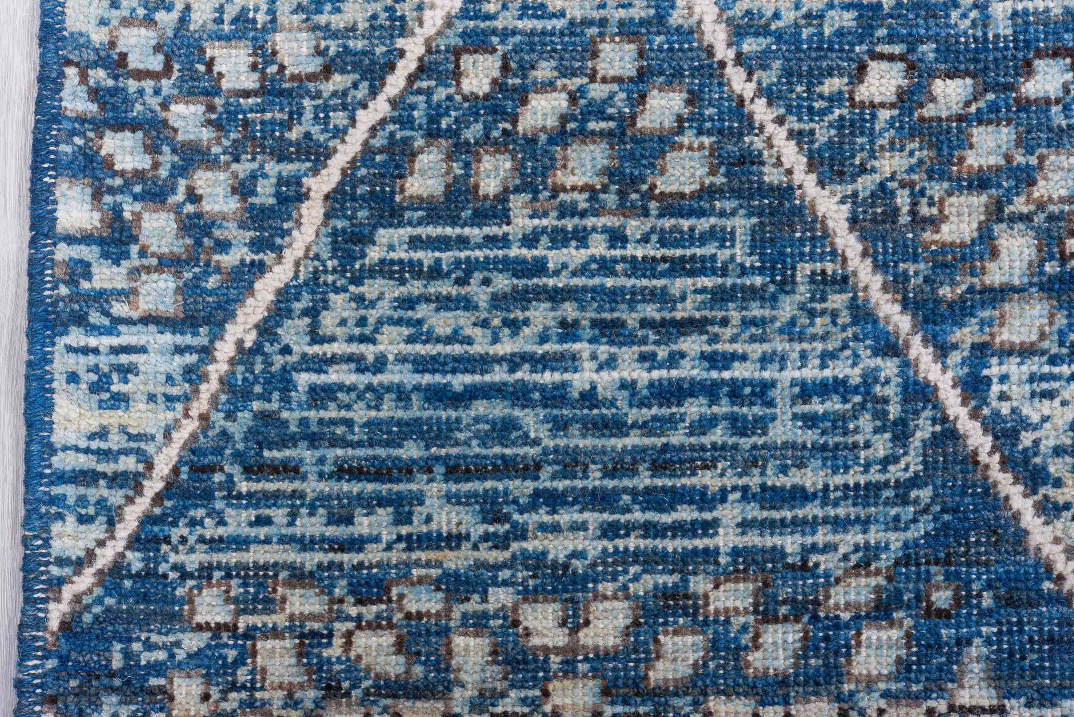 9' x 11' one-of-a-kind handmade vintage Tulu large size rug. Color palette: blue, ivory, indigo, slate, denim, purple, gray