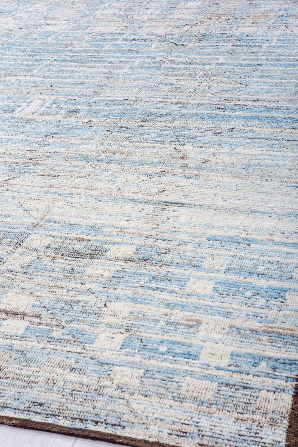 9' x 12' one-of-a-kind handmade vintage Tulu large size rug. Color palette: sky blue, ivory, taupe, brown, gray, light blue