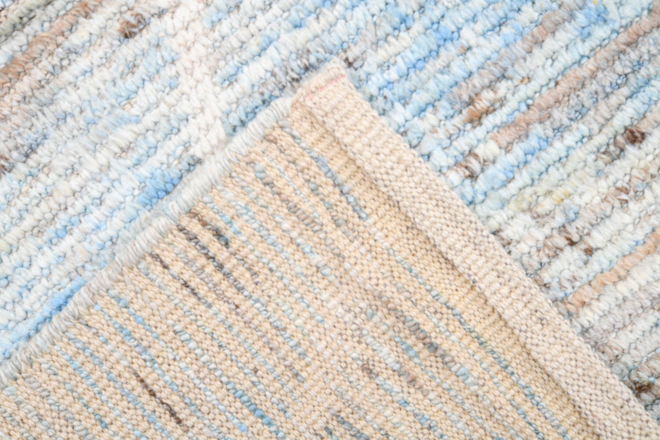 10' x 14' one-of-a-kind handmade vintage Tulu large size rug. Color palette: ivory, light blue, taupe, brown, cream, gray