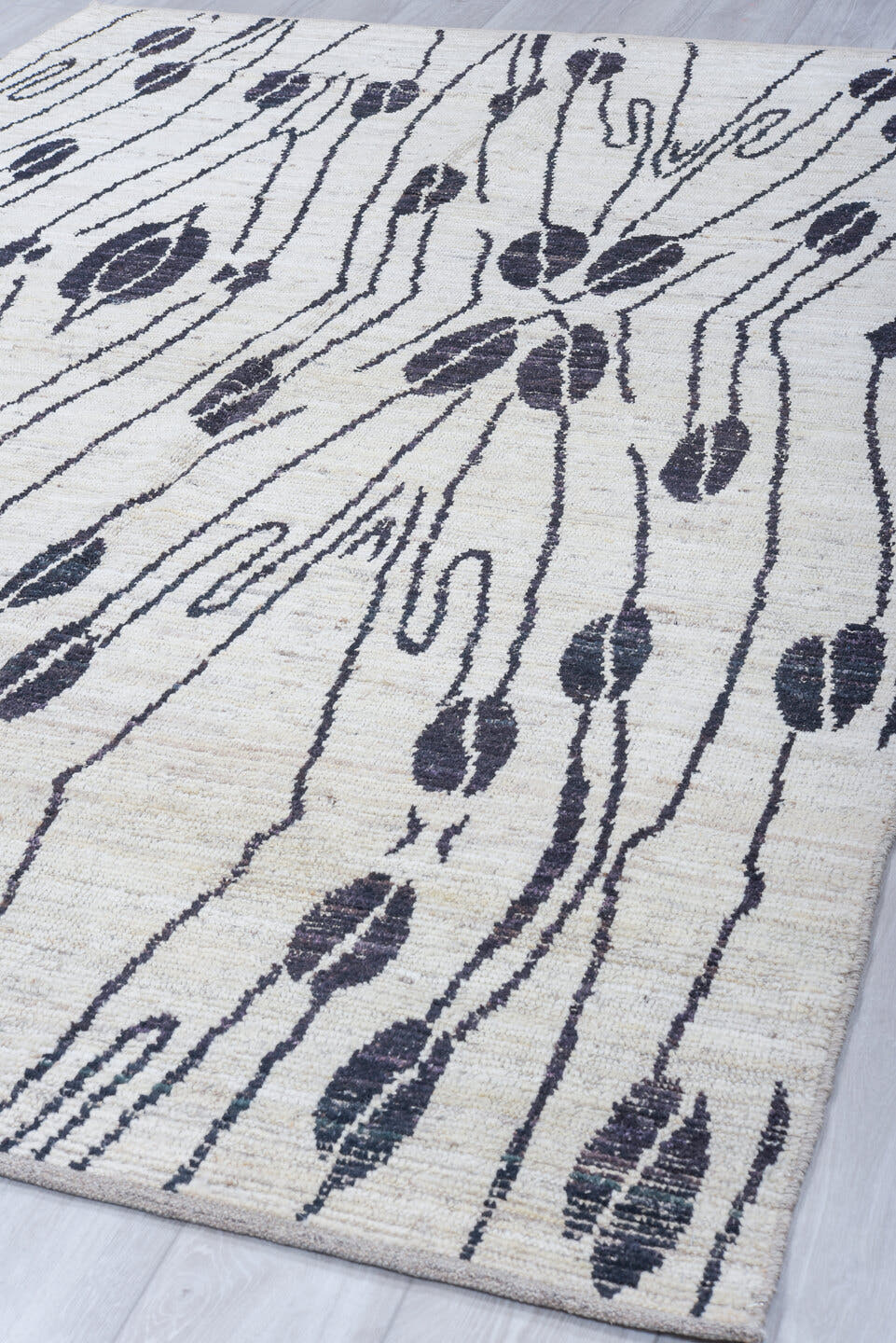 6' x 9' one-of-a-kind handmade vintage Tulu medium size rug. Color palette: ivory, charcoal, cream, taupe, gray, black