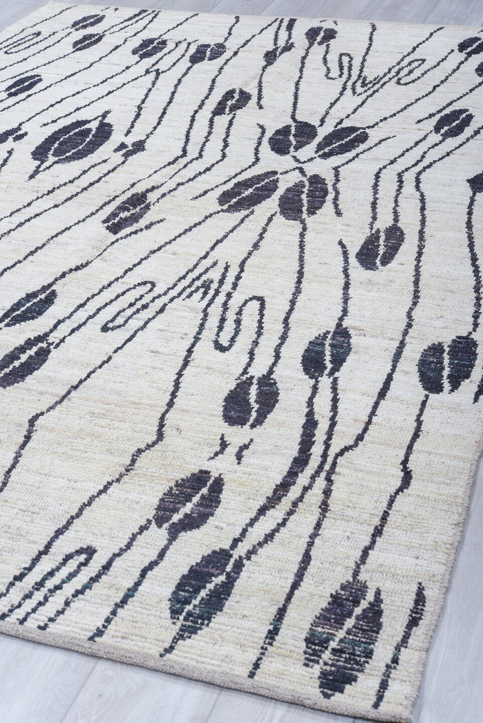 6' x 9' one-of-a-kind handmade vintage Tulu medium size rug. Color palette: ivory, charcoal, cream, taupe, gray, black