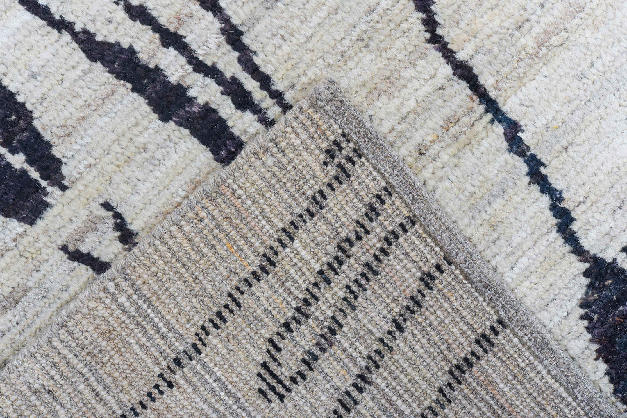 6' x 9' one-of-a-kind handmade vintage Tulu medium size rug. Color palette: ivory, charcoal, cream, taupe, gray, black
